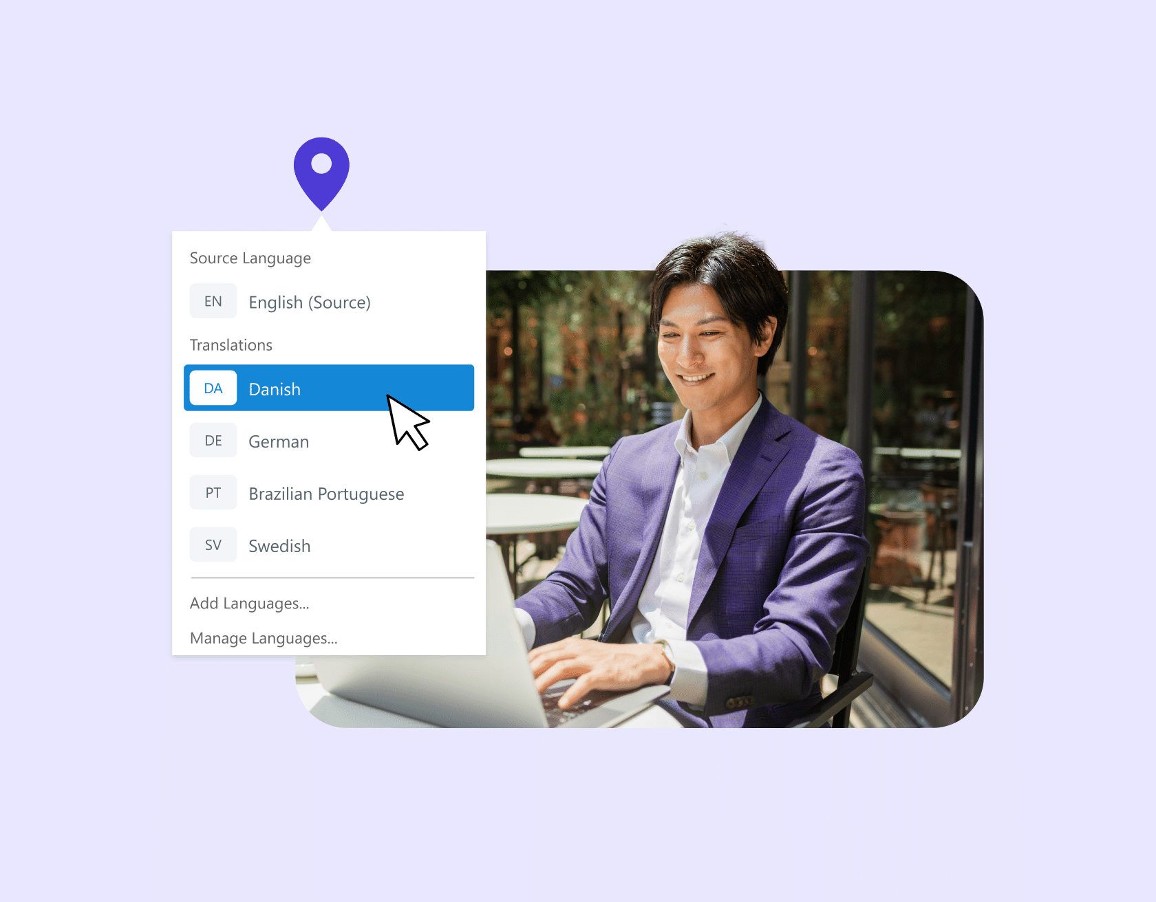 Man sitting in front of laptop, selecting Danish translation.