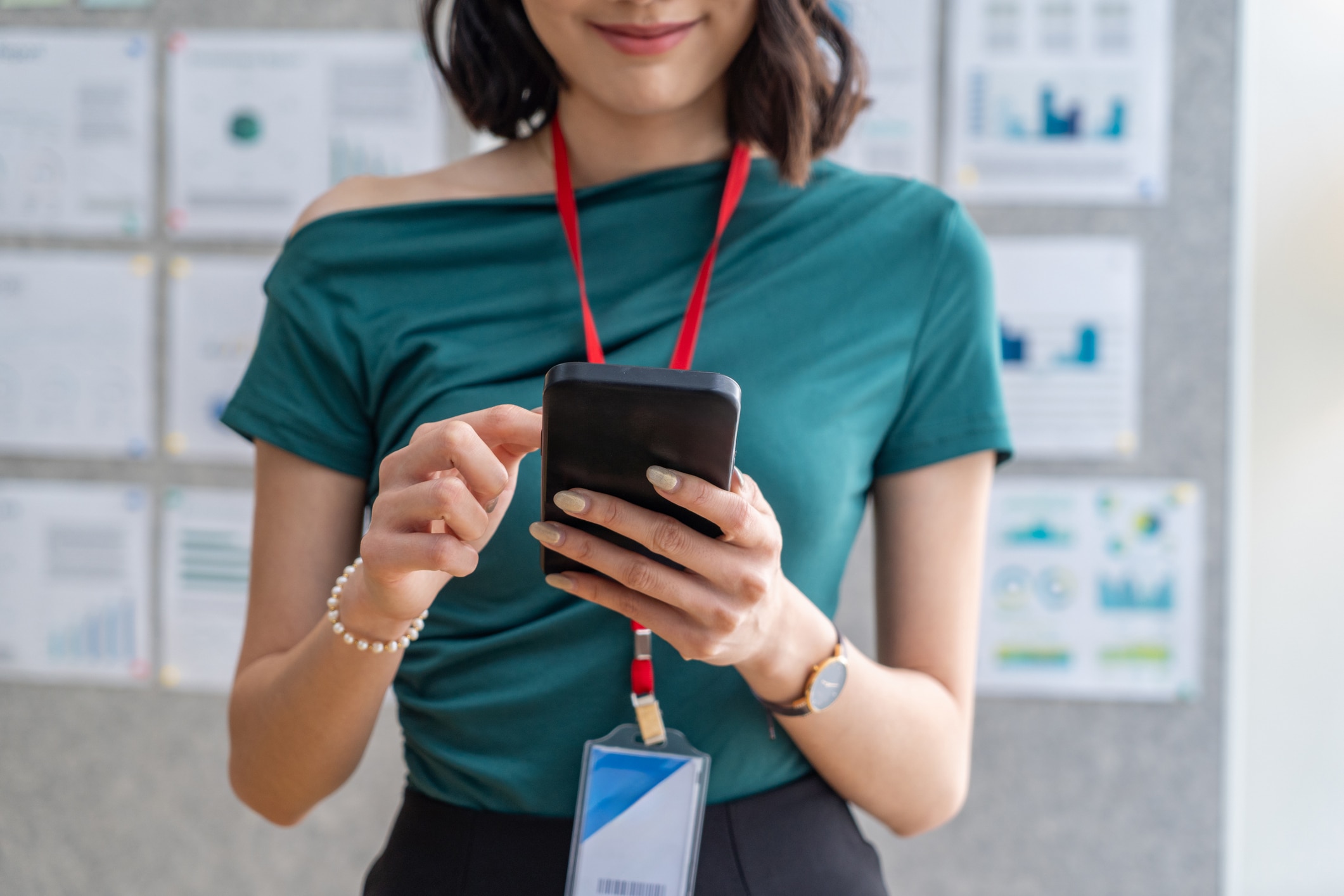 Employee scrolling on their phone
