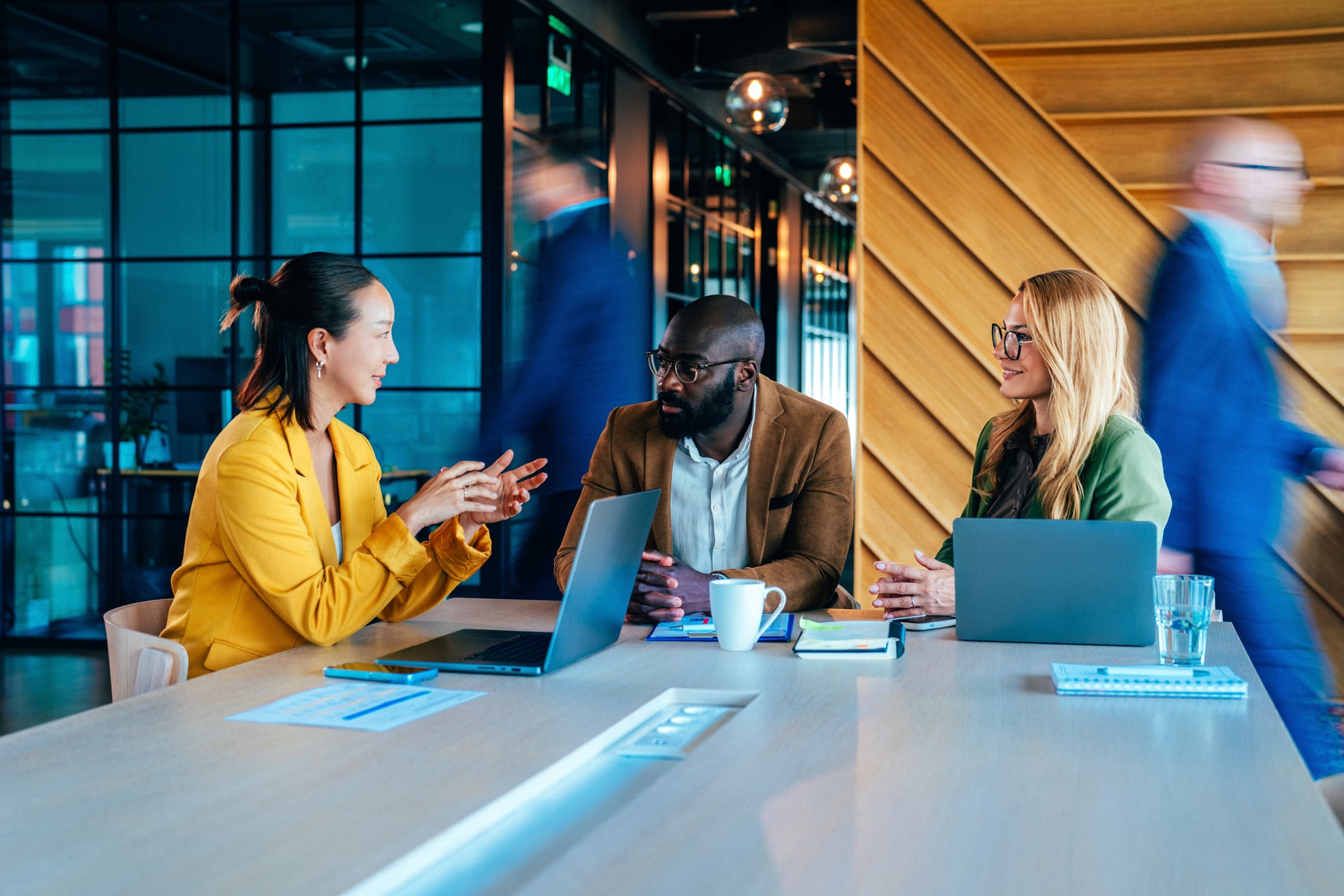 Professionals having a discussion at a conference table